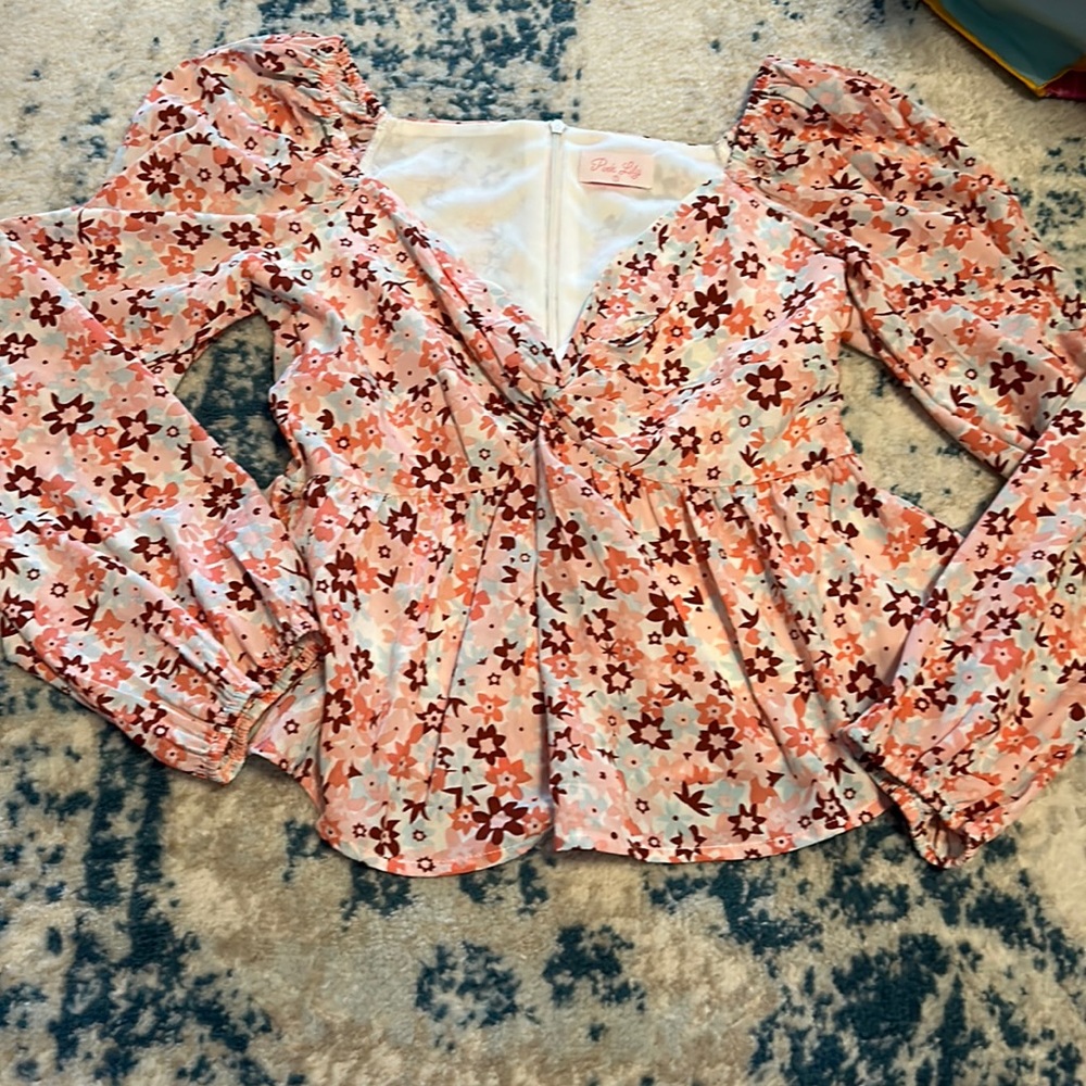 Pink lily pink floral long sleeve top with zipper back. Size small